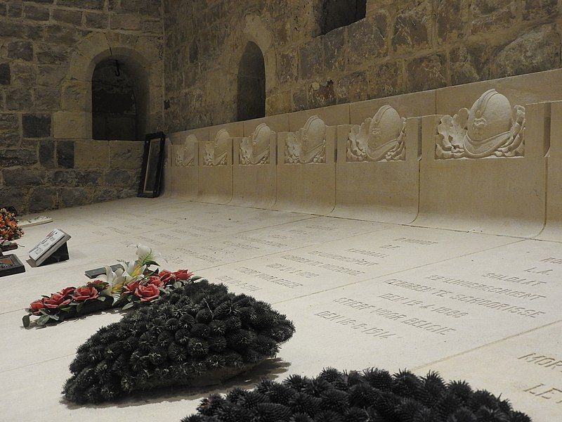 White tombstones with a oak leaf in Grimde Necropolis, Belgium