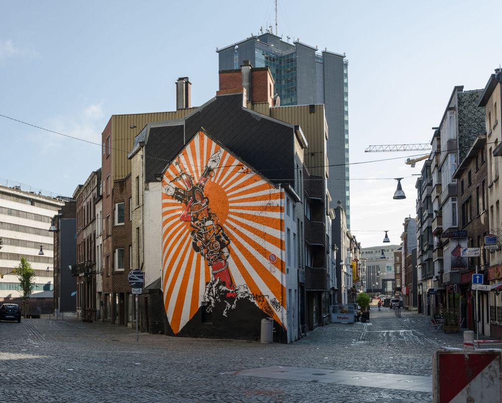 A vibrant street mural in the industrial city of Charleroi. 