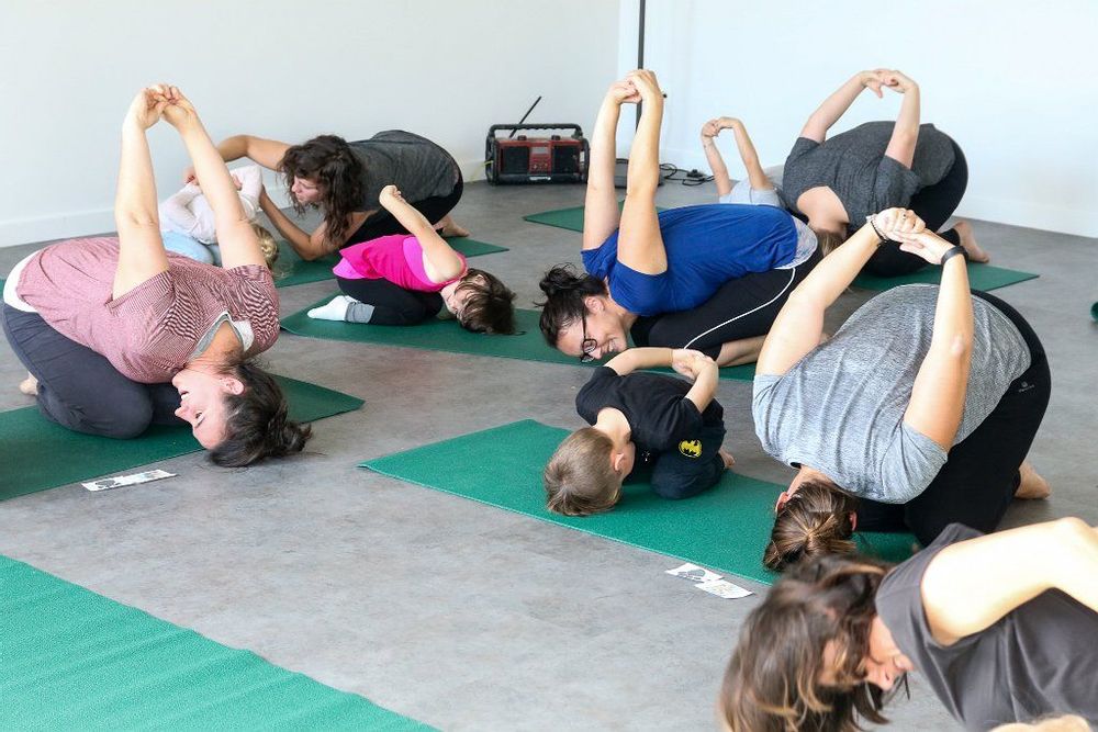 Yoga group with adults and children