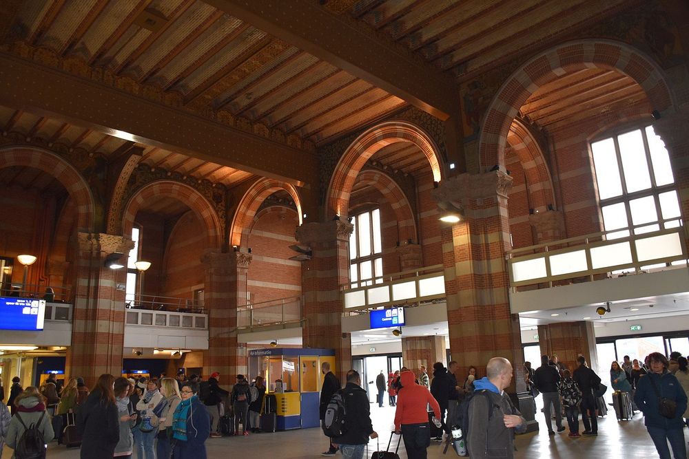 The inner grand hall of Amsterdam Centraal Station.