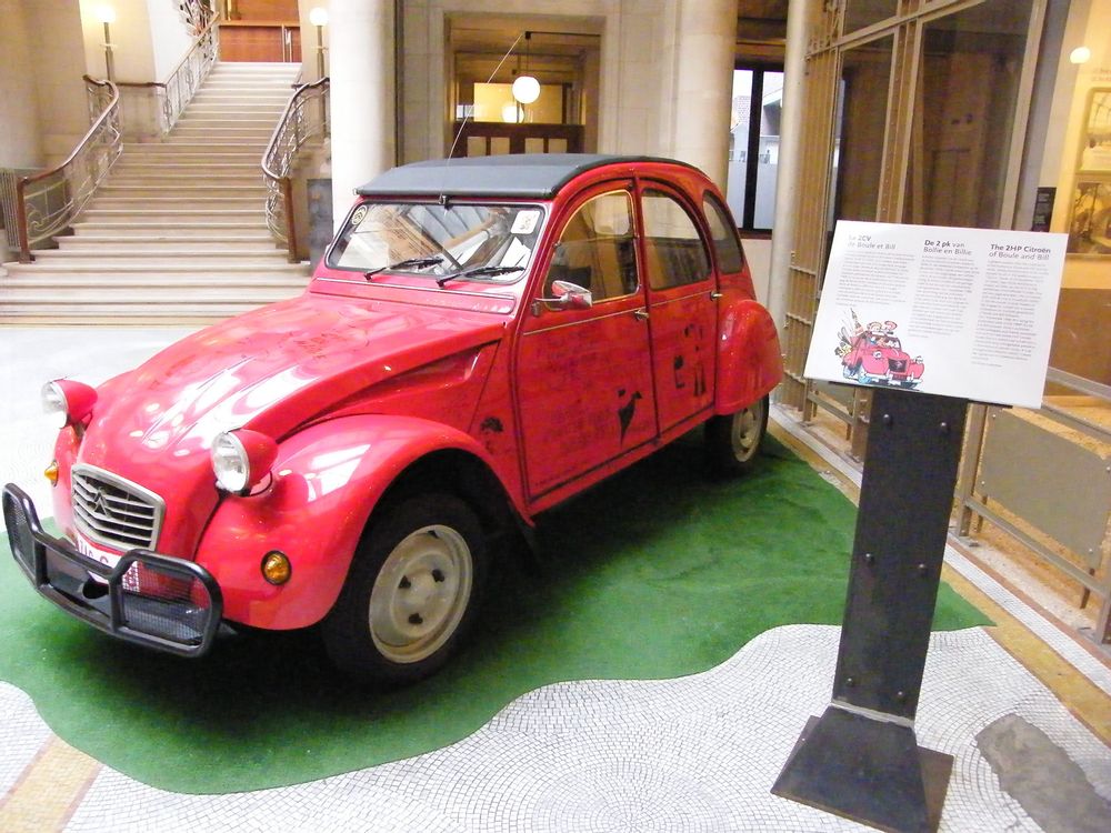 The model of a red car of a well-known comic character at the Comics Art Museum, in Brussels.