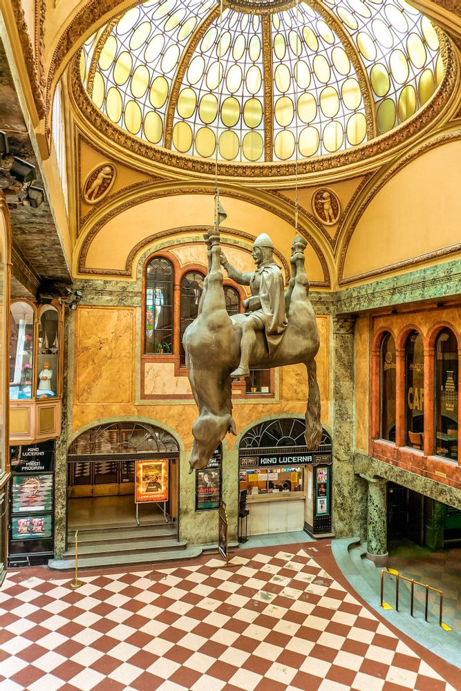 Statue hanging from the ceiling in Prague, Czech Republic