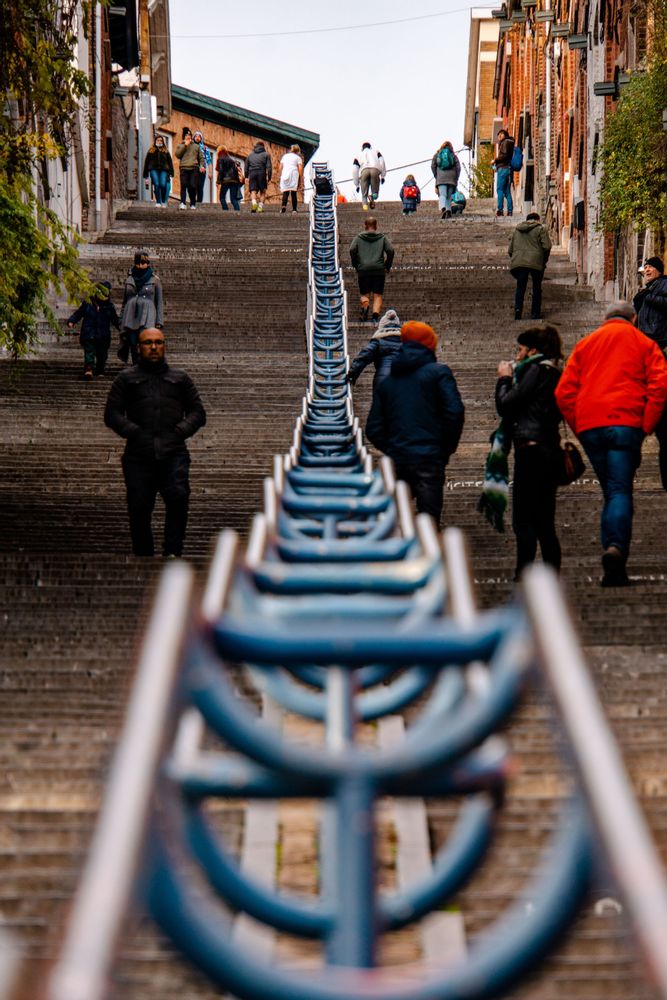 Crowd walking up and down the staircase Montagne de Bueren, Liege, Belgium