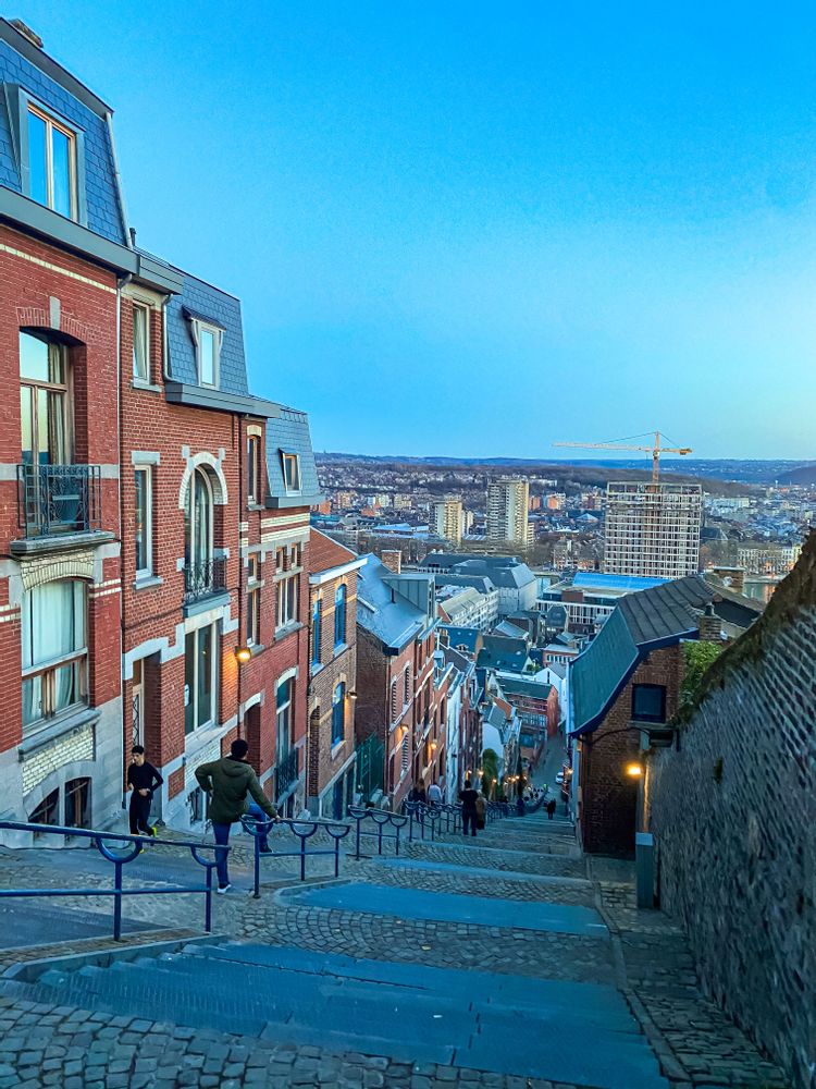 Man jogging up the steps of Montagne de Bueren, Liege, Belgium