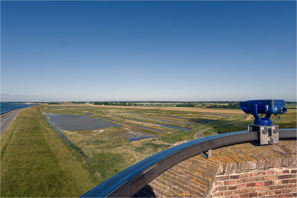 A blue lookout stand on the top of Plompe Tower in Zeeland, Netherlands.