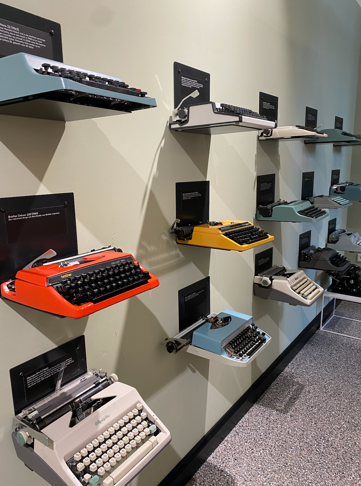 A wall of different typewriters on display at Broese.