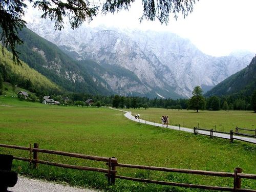 A trail for biking and walking winding itself through the mountainous Logar Valley.