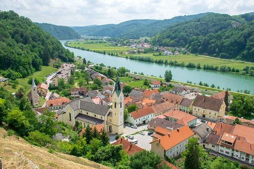 Sevnica Castle overlooking the town of Sevnica by the riverside.