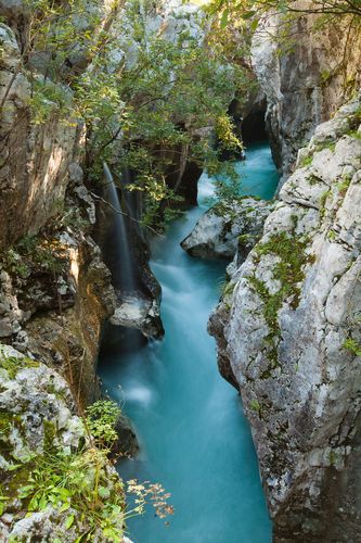 The running waters inbetween a quiet beauty of the Great Soča Gorge.